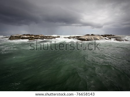 Seal island with dramatic stormy weather