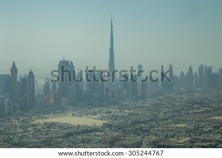 Dubai, United Arab Emirates - October 17, 2014: Photograph of Dubai skyline with the famous Burj Khalifa taken from a seaplane.