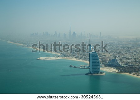 Dubai, United Arab Emirates - October 17, 2014: Photograph of the famous Burj Al Arab hotel in Dubai taken from a seaplane.