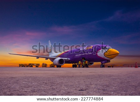 Udon Thani , THAILAND - October 30,2014:  Nok Air Flight at Udon Thani Airport on Oct 30, 2014 inUdon Thani, Thailand. Nok Air is the budget airline of Thai Airways International.