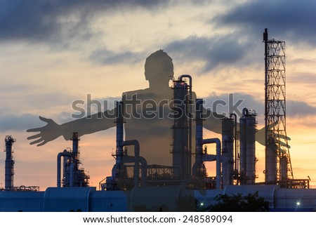 Double exposure of business man and Oil refinery factory plant or petrochemical plant