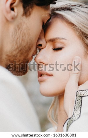 Similar – Image, Stock Photo Newlywed couple kissing during romantic travel
