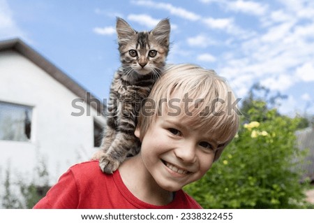 Image, Stock Photo Little boy and cat taking selfie with mobile phone on bed