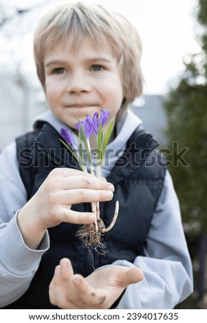 Similar – Image, Stock Photo Little boy with flower in the hands