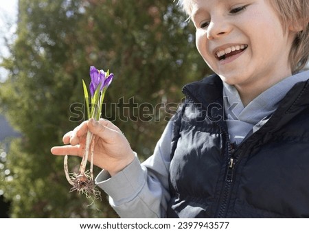 Similar – Image, Stock Photo Little boy with flower in the hands