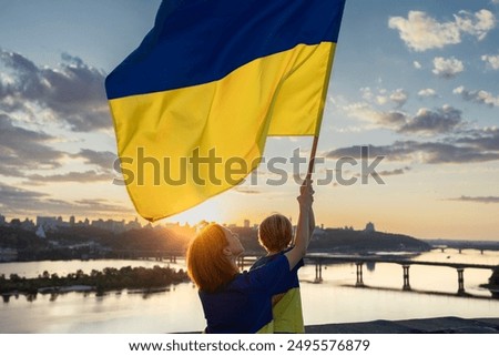 Similar – Foto Bild Peacesymbol auf ukrainischer Flagge