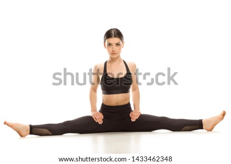 Similar – Image, Stock Photo Flexible woman doing side bend and practicing yoga