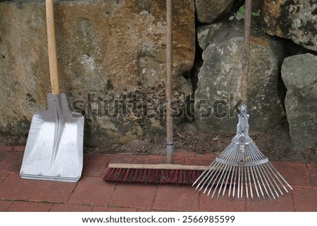 Similar – Image, Stock Photo Broom and shovel standing at brick wall