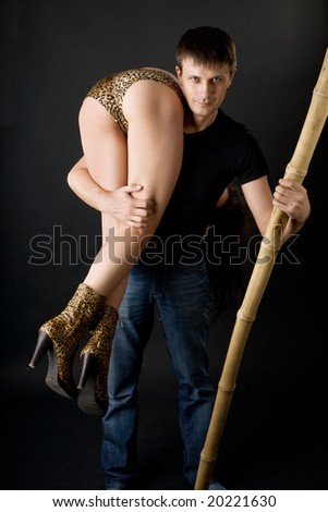 cute  caveman with a club and a girl