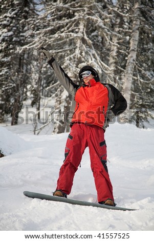Young man with snowboard.