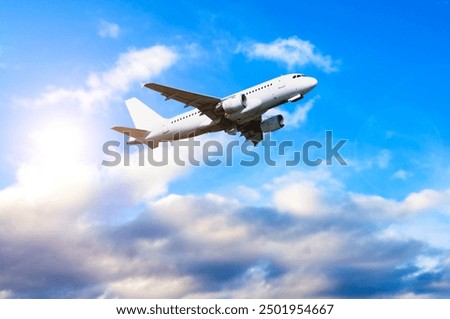 Similar – Image, Stock Photo Plane flying on the sky between the clouds in a minimalistic image with a saturated blue color