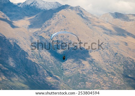 Paragliding over the city of Bernal, New Zealand