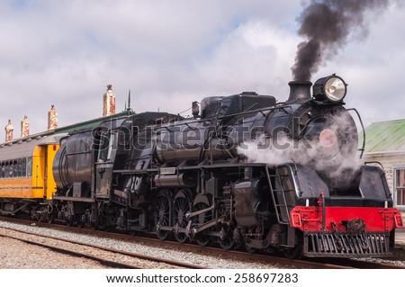 Classic old steam train in the station