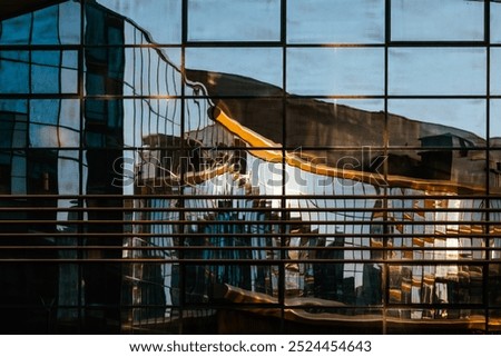 Similar – Foto Bild Reihen von verglasten Fenstern der Fassade eines modernen Bürogebäudes