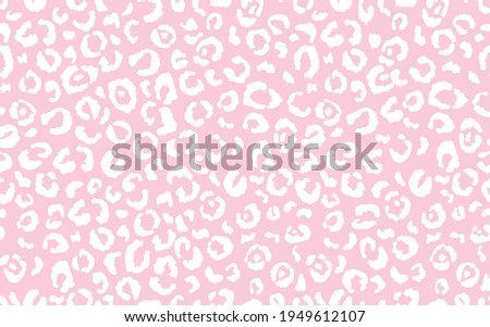 Abstract modern leopard seamless pattern. Animals trendy background. Pink and white decorative vector stock illustration for print, card, postcard, fabric, textile. Modern ornament of stylized skin.