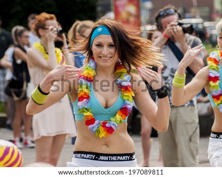 SZCZECIN, POLAND, MAY 23, 2014: Juwenalia, is an annual students\' holiday in Poland, usually celebrated for three days in late May.College girl dance away at an outdoor zumba class.