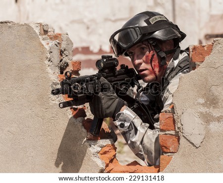 SZCZECIN, POLAND - MAY 31, 2014: Commando Soldier in Polish Army uniform during  Historical reenactment
