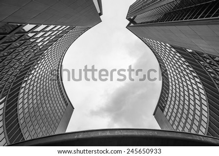 Looking up at the curved towers of the Toronto Canada City Hall.