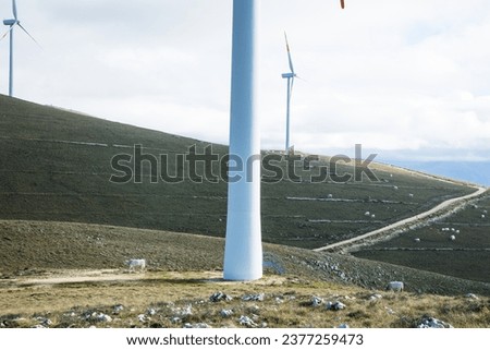 Similar – Image, Stock Photo Shadow of a wind turbine on grain field