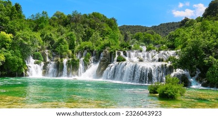 Similar – Image, Stock Photo Waterfall in green forested mountains