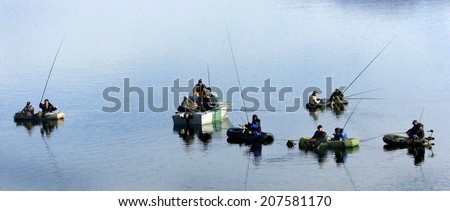 Fish-man fishing on the lake, near Sofia, Bulgaria Dec 3, 2006