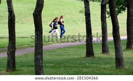 People walking in spring day in the park in Sofia, Bulgaria on may 25, 2015