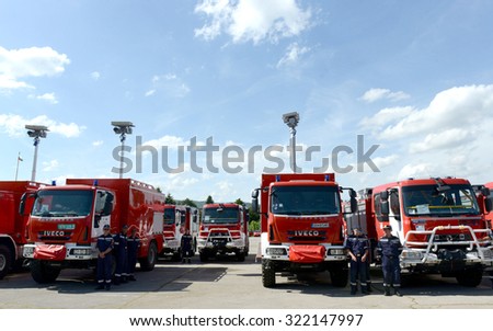 Sofia, Bulgaria - June 9, 2015: New fire trucks are presented to their firefighters in a field next to the main Fire department administrative building in Sofia