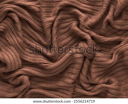 Image, Stock Photo Brown crumpled knitted scarf or sweater texture, top view. Texture background of warm crocheted clothing textile. Knitwear fabric.