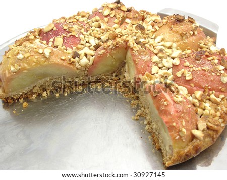 Cutted  wholemeal apple cake  on a cake tray