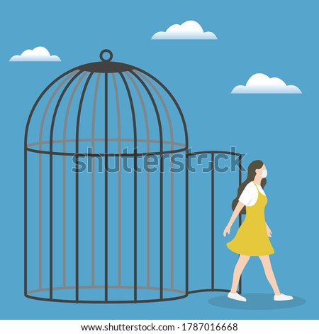 Freed, woman came out of the open cage. unlock the cage and people return to work. restart business in normal operation after peak of Coronavirus COVID-19 outbreak concept. new normal concept