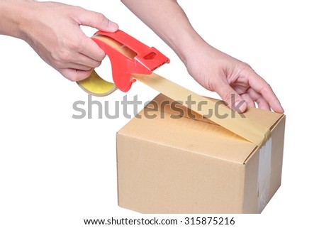 man hand packing box with tape on cardboard box