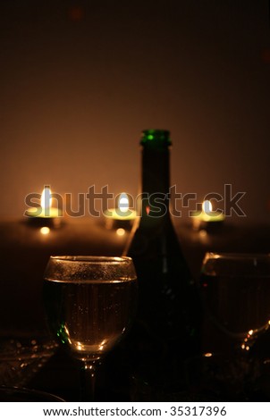 Romantic candlelight dinner with champagne