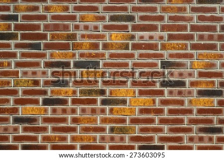 Photo of multicolored brick wall of the old brick background