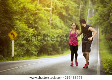Man hand To help women A highly successful run uphill
