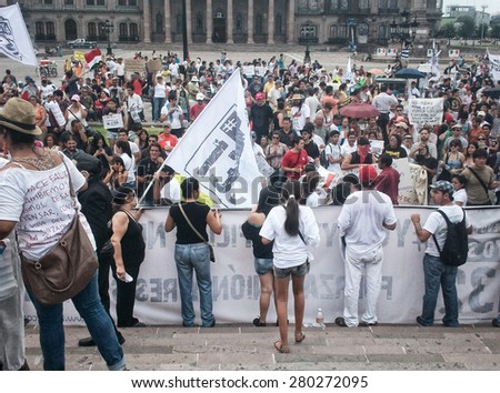 MONTERREY, NUEVO LEON/MEXICO - July 29, 2012: Citizens at a protest march for political justice promotion, organized by \