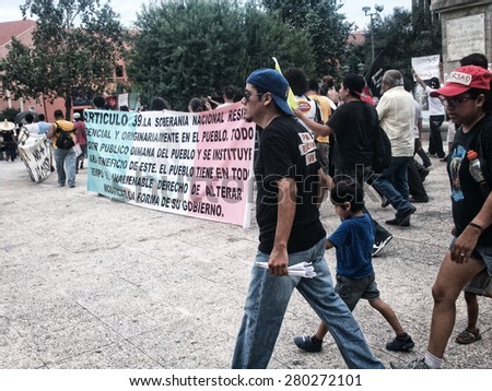 MONTERREY, NUEVO LEON/MEXICO - July 29, 2012: Citizens at a protest march for political justice promotion, organized by \
