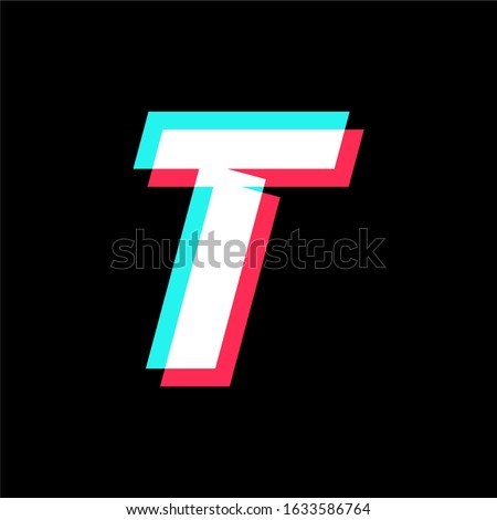 initial letter T with glyph effect.