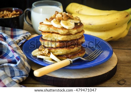 Healthy banana pancakes with oats and nuts for breakfast 商業照片 © 