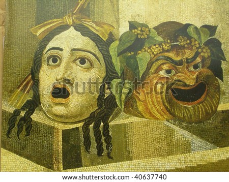 tragedy and comedy theatre masks on a Roman mosaic
