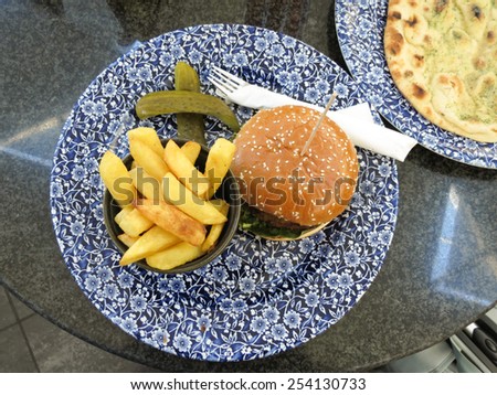 veggie burger, French fries and garlic bread  - a typical British pub meal