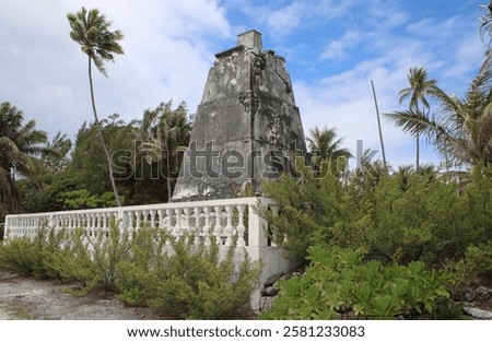 Remote beacon on island under orange sky