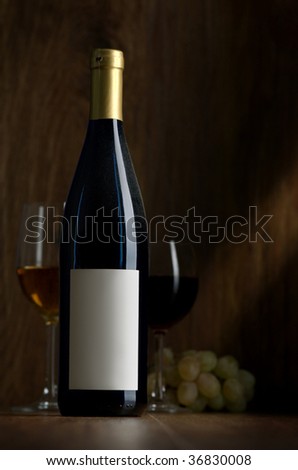 Bottle of wine and glasses with wine