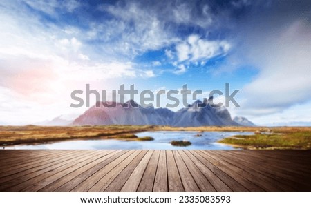 Similar – Image, Stock Photo Picturesque landscape of rocks in sea on sunset