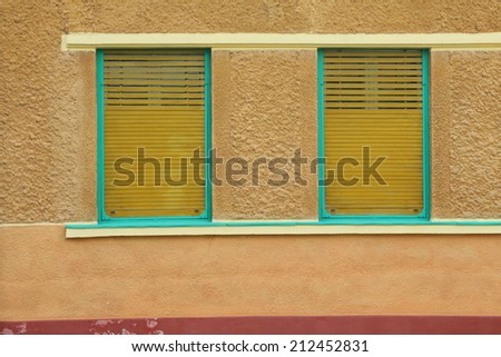 Windows with shutters closed