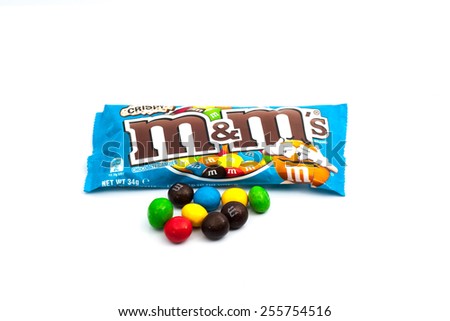 PAHANG,MALAYSIA - FEBRUARY 25, 2015: Illustrative Editorial,Closeup of M&M\'s milk chocolate,crispy candies made by Mars Inc.Colorful candies outside.