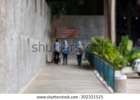 Abstract of blurred people in mall walkway
