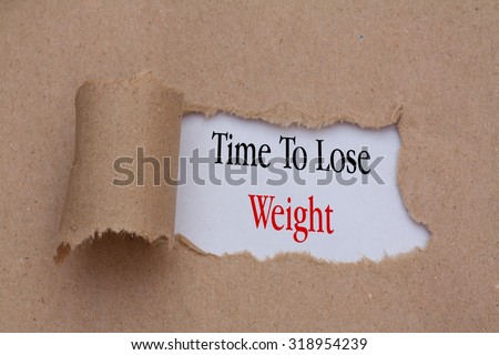 Time to lose weight text concept,torn brown paper