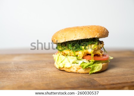 Classic Burger. Tasty and fastfood burger meal on the table