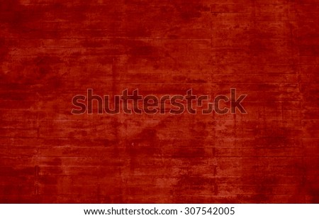 Urban red background with uneven scratched concrete wall