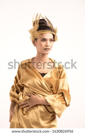 Beautiful angle in golden dress,ballet dance bless in celebration,wish everybody happy.